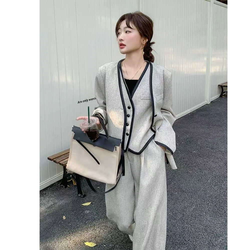 盐系穿搭减龄三件套装女2025春季新款高级气质西装马甲阔腿裤套装