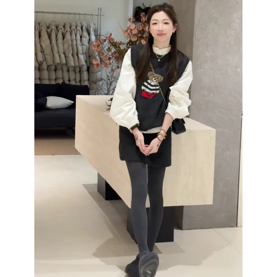秋冬穿搭一整套女2026新款木耳边衬衫叠穿针织马甲百搭短裙三件套
