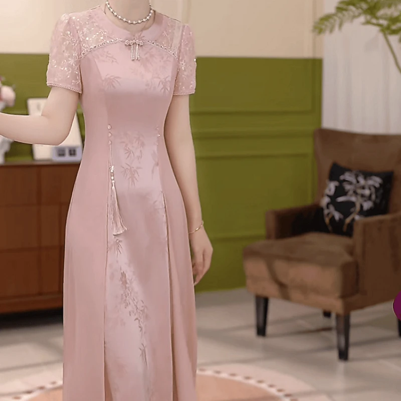 新中式国风气质女装2025夏季新款显瘦收腰粉色印花修身显瘦连衣裙