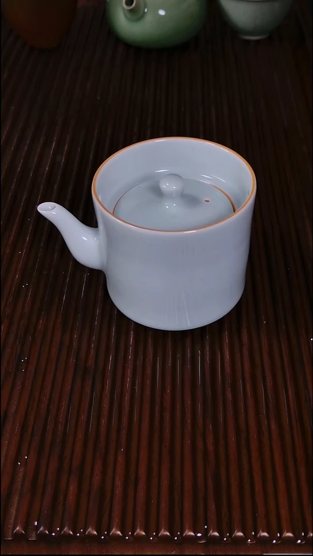 上**签和青禾官青提梁壶