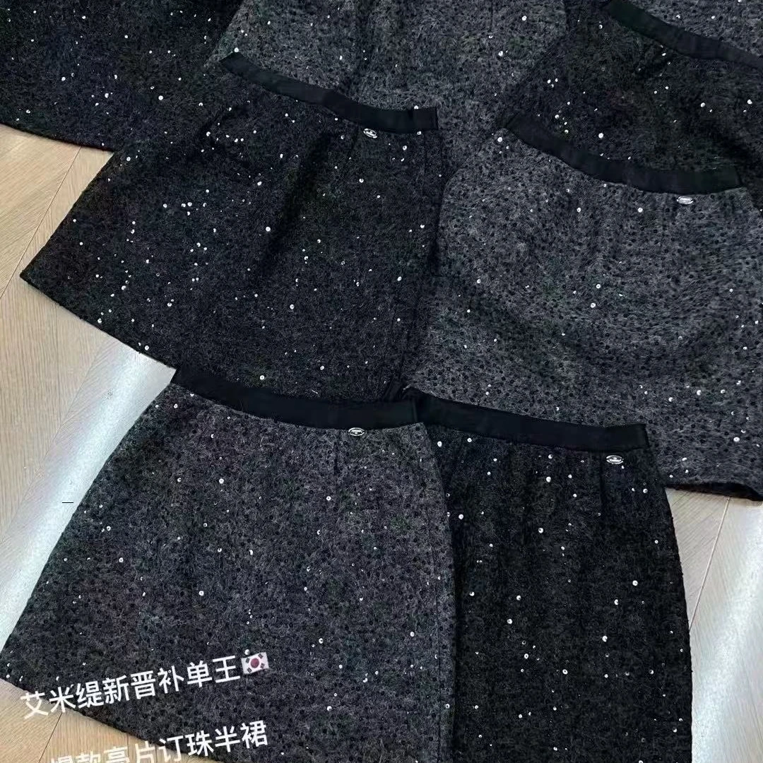 99161新年礼物感~重工订珠亮片感短裙