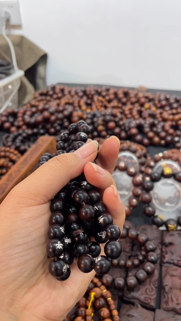 木临****行枣木玉化镶银1.0圆珠108颗金光全文