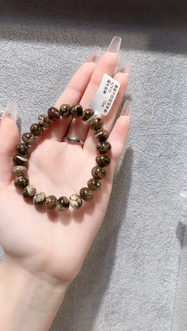 琥珀未镶嵌珠宝奇石G****琪抚顺琥珀       黑金干白花10M