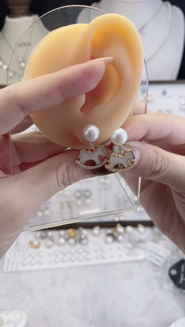 合金耳饰淡水珍珠凝****?0020