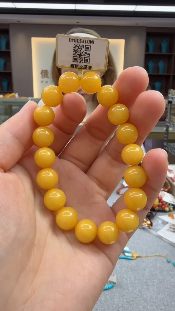 未镶嵌琥珀手链68秒拍号 假一罚三