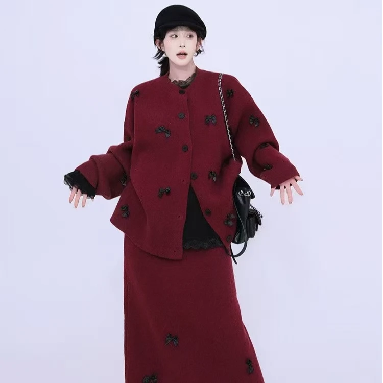 港风设计蝴蝶结时尚套装女冬季新款慵懒针织开衫高腰半身裙两件套