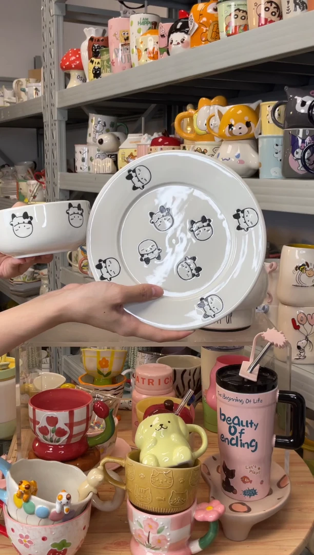 陶浮力浮雕小牛一盘一碗