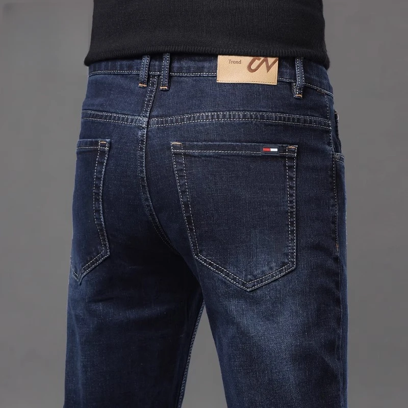 香港秋冬加绒2025蓝黑色牛仔裤男士修身直筒潮流百搭弹力休闲长裤