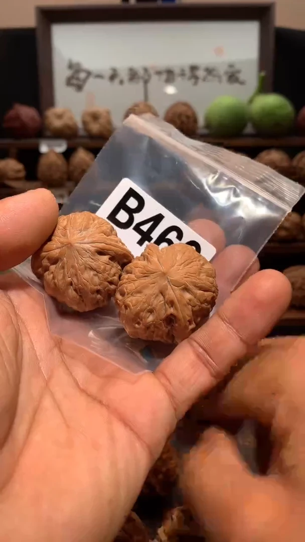 桃核把件【丰泰】38   左铁锤开裂瑕疵处理