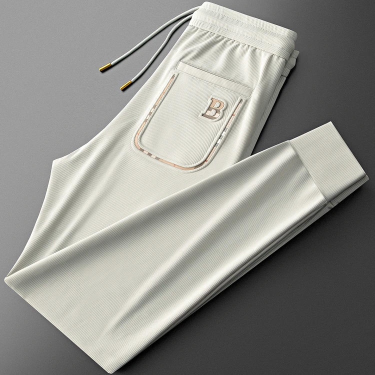 希敦纽勒夏季顺滑抗皱速干裤子男时尚潮流压胶男士小脚卫裤休闲裤