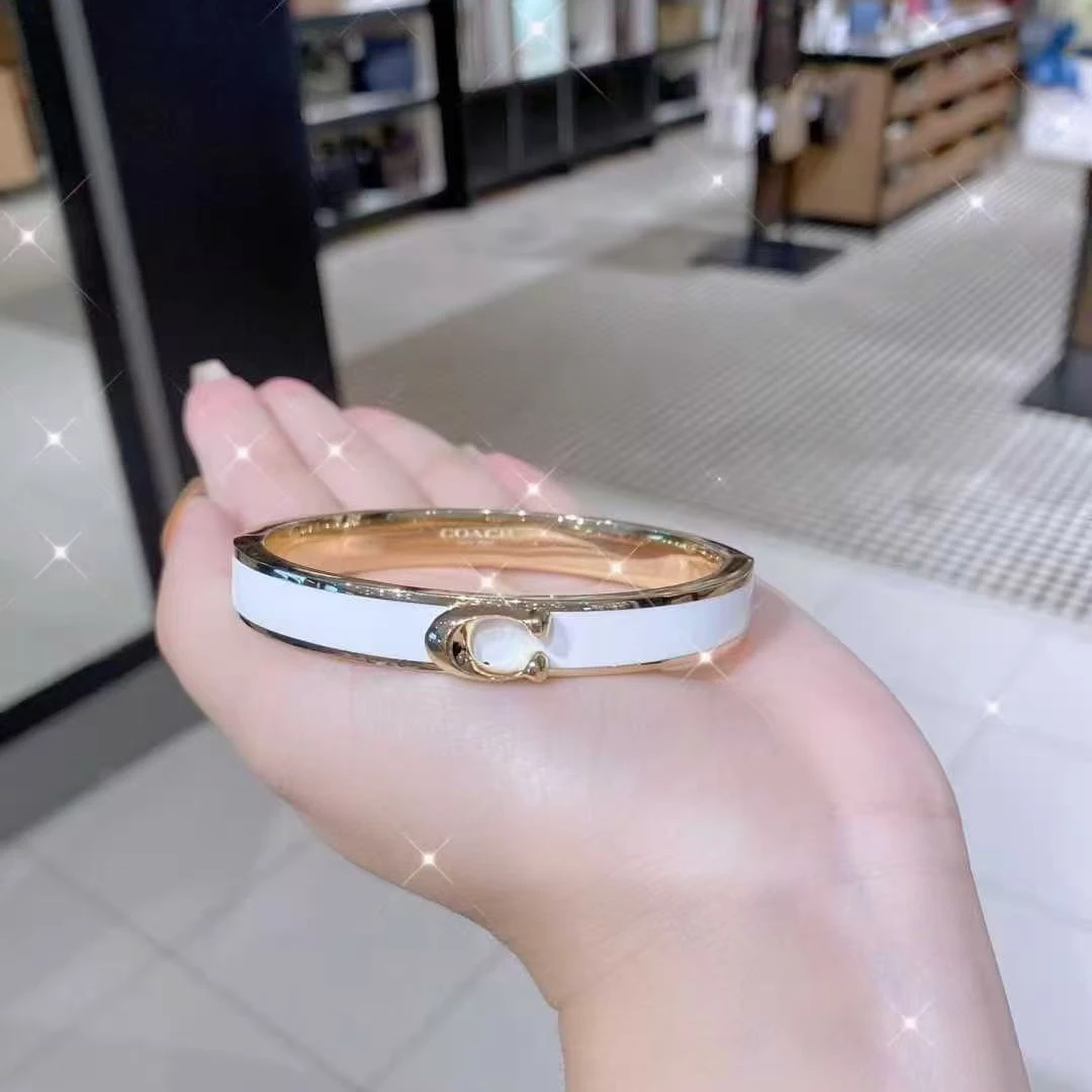 Coach蔻驰女士C字珐琅磁扣手镯白色F67480CUD