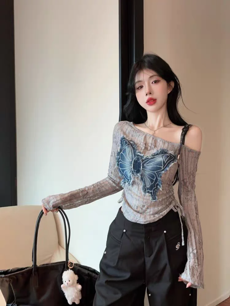 废土风牛仔蝴蝶长袖t恤女早春美式辣妹一字肩上衣不规则防晒罩衫