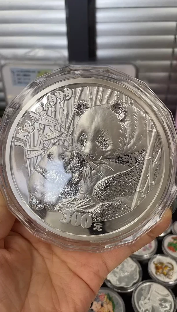 纯银2005公斤银猫1000克无证盒