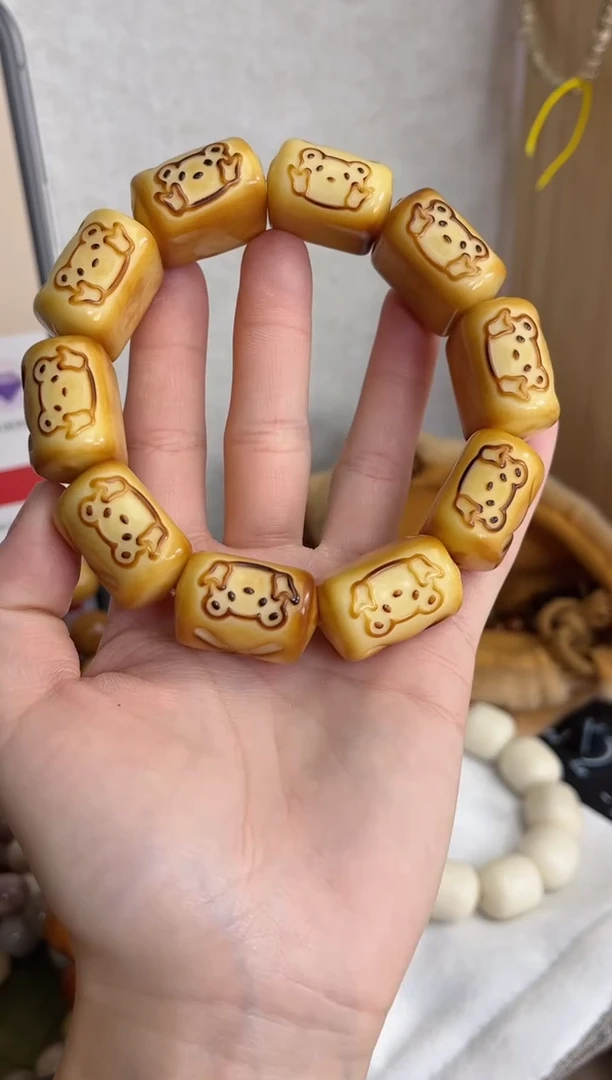 菩提根/象牙果手串象牙果面包熊猫22*24手串