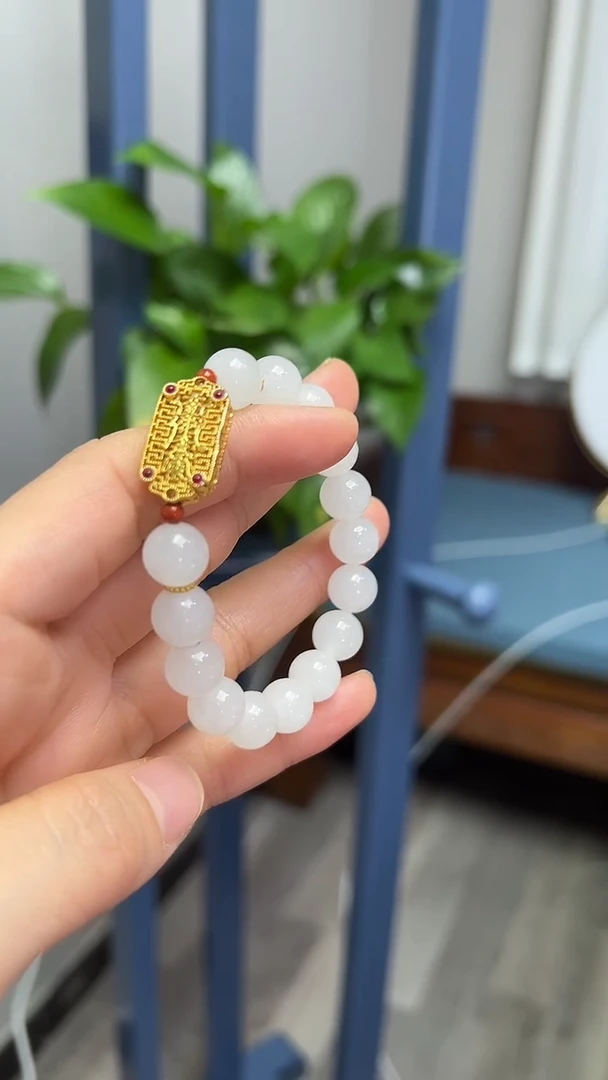 18K金镶嵌手串和田玉珍****a手串