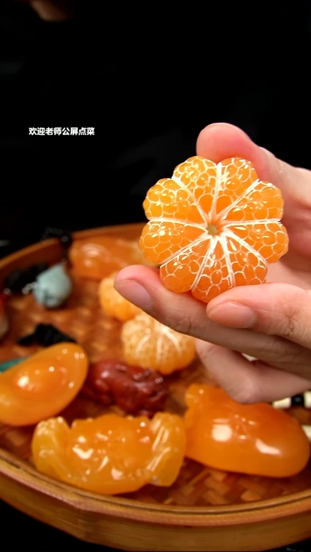 印尼石小桔子手把件