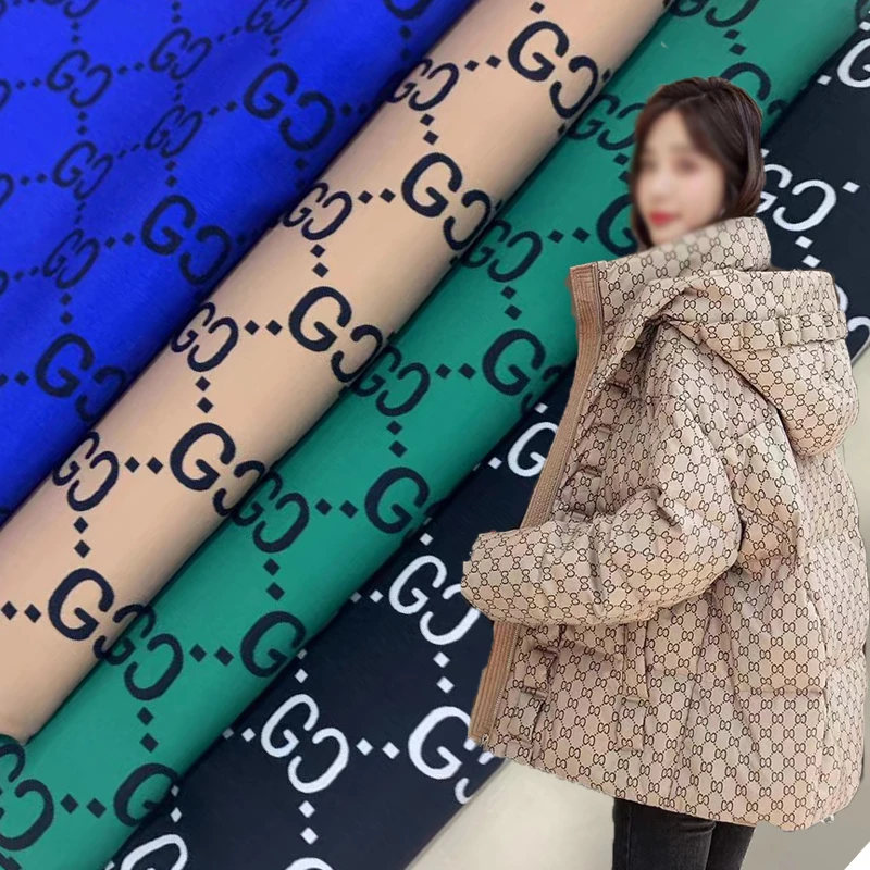 羽绒服印花面料高档新款格子CG印花防水柔软棉衣马甲制衣布料批发