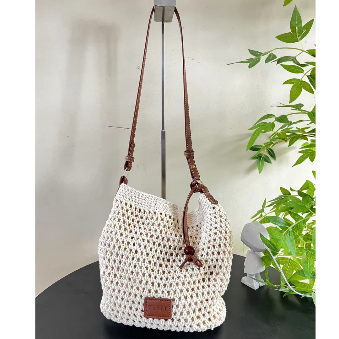 A09春夏时尚手工编织包单肩斜跨托特包镂空海边度假文艺慵懒包