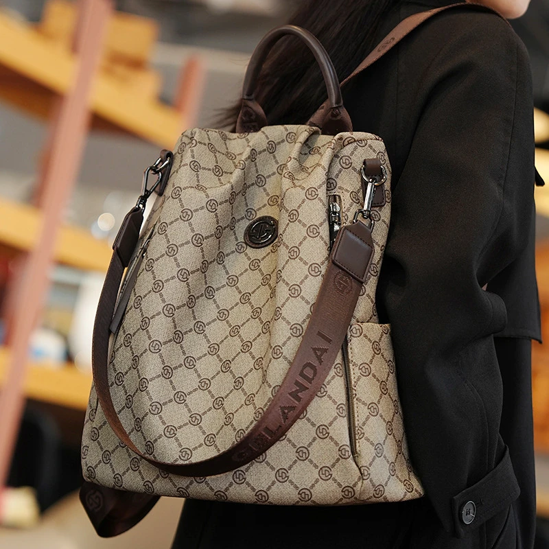 香港戈兰黛品牌正品真皮高级印花外出大容量百搭背包女双肩包多用