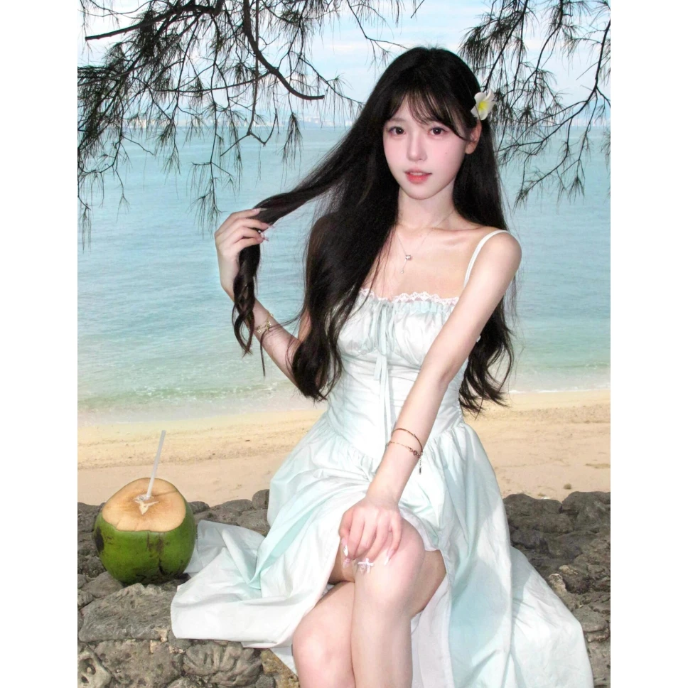 薄荷夏季仙女海边吊带度假连衣裙新款收腰气质显瘦露背长裙