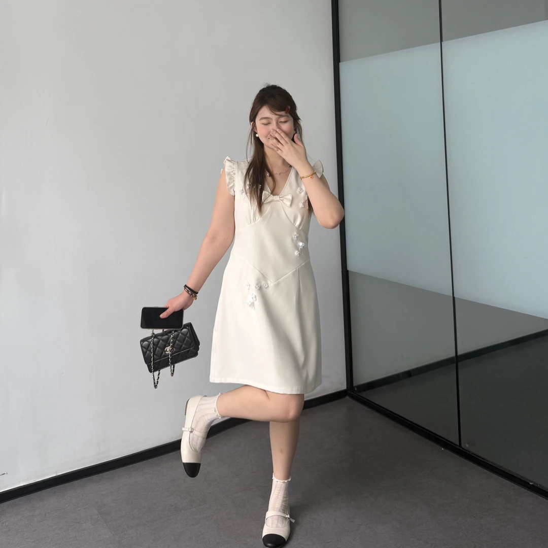 晶咕软软【黑白缪斯】法式重工气质设计感V领蝴蝶结立体珠花连衣裙