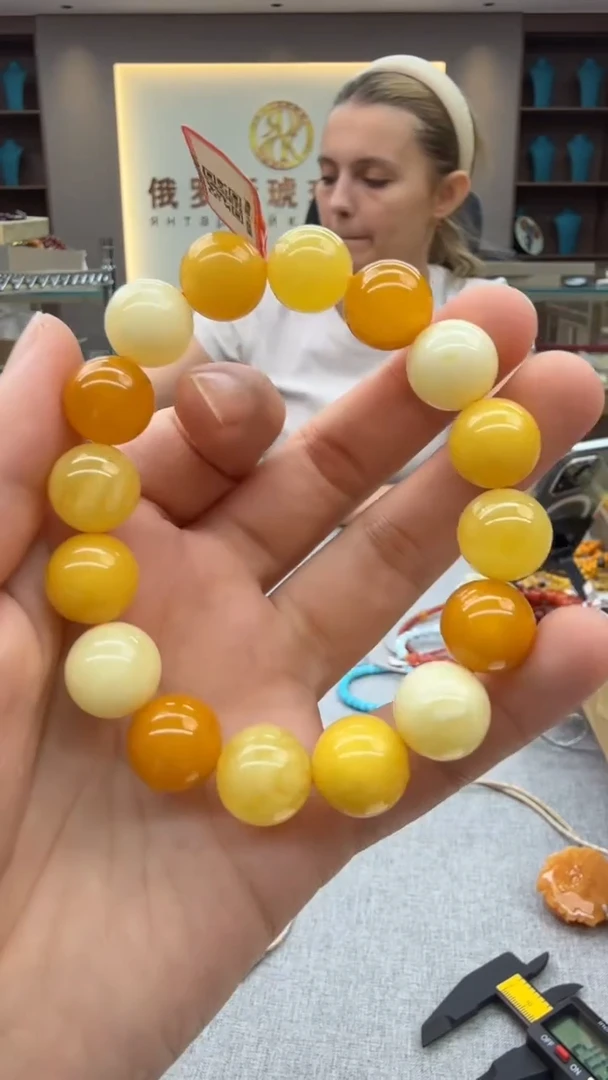 未镶嵌琥珀手链216秒拍号 假一罚三