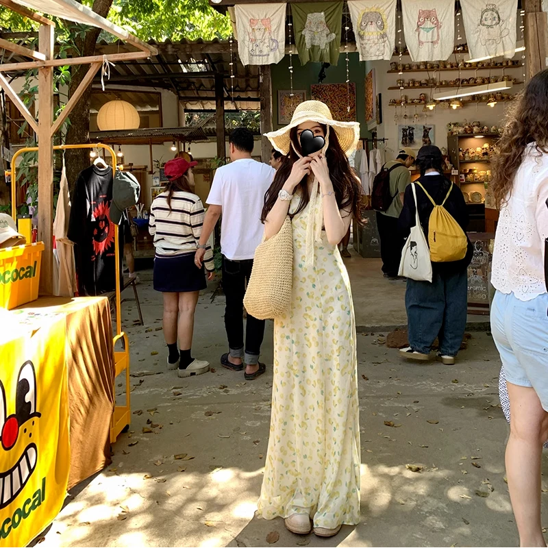 【柠檬树下】2025年春夏新款显瘦清新阳光吊带连衣裙长裙