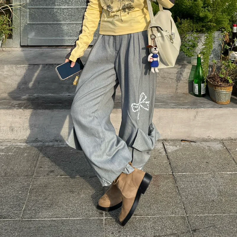河岸家设计师AlexiaSandra蝴蝶结印花大口袋阔腿裤长裤女25秋