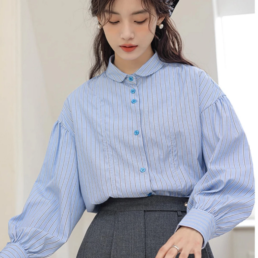 2025早春新款蓝色条纹长袖衬衫女设计感小众清新甜美法式别致上衣