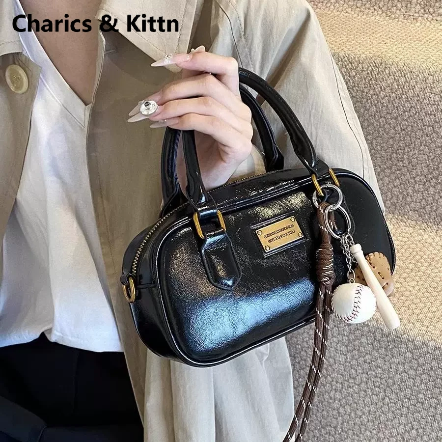 Charics&Kittn包包女式2025新款真皮斜挎包小众复古手提保龄球包