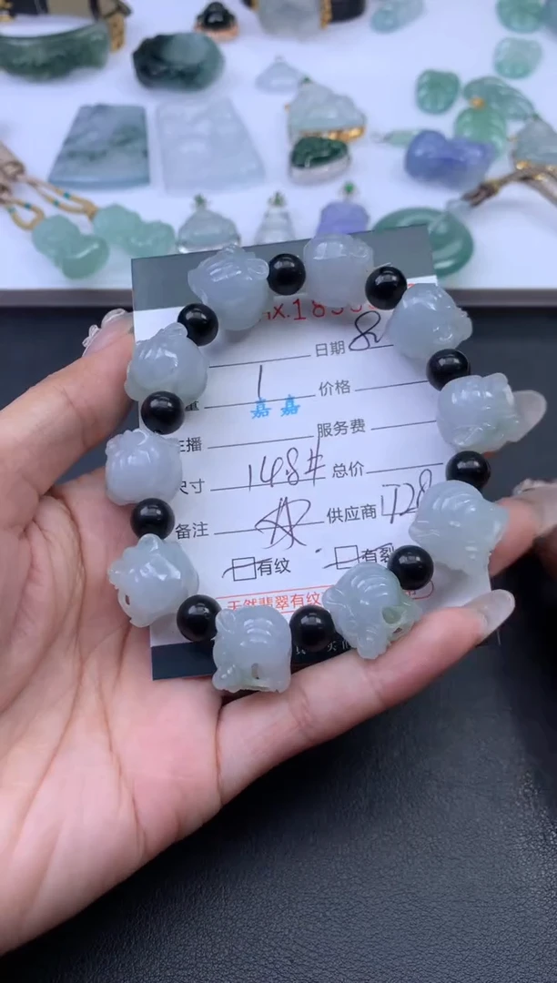 翡翠挂件未镶嵌哈轩 手串1（有纹有裂）