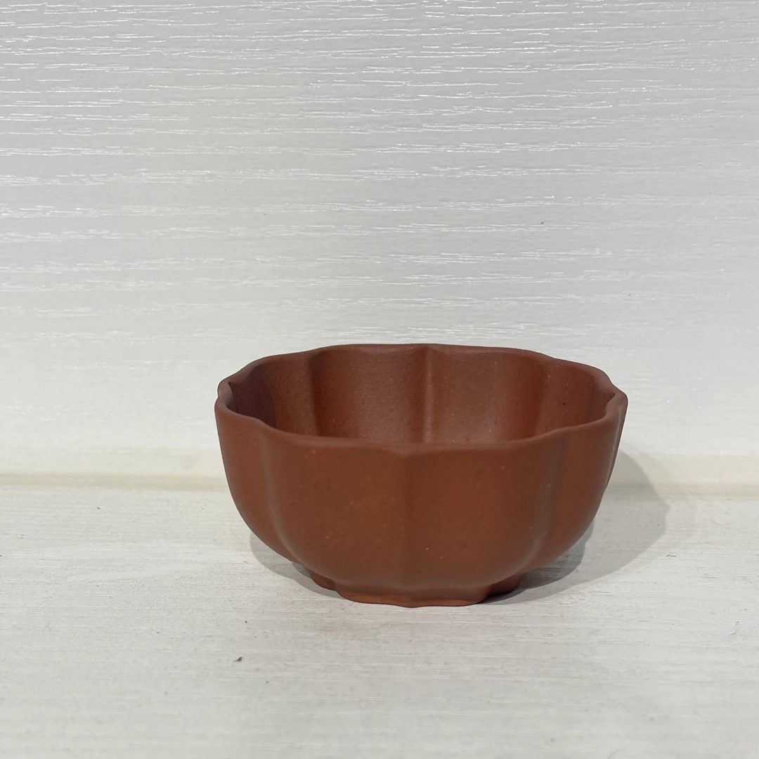 宜兴紫砂原矿紫泥菱花主人杯