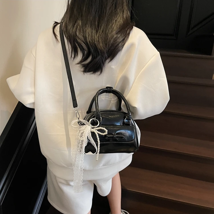 【喜饰家】蝴蝶结包包流行高级感小众超火手拎包单肩斜挎枕头包