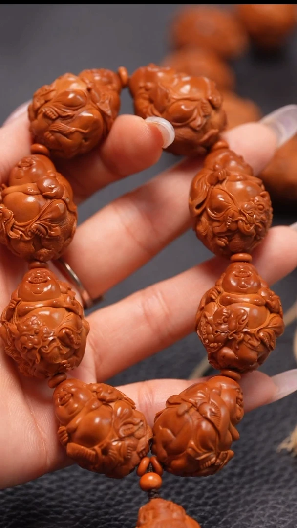 橄榄核手串2.35/骑兽弥勒