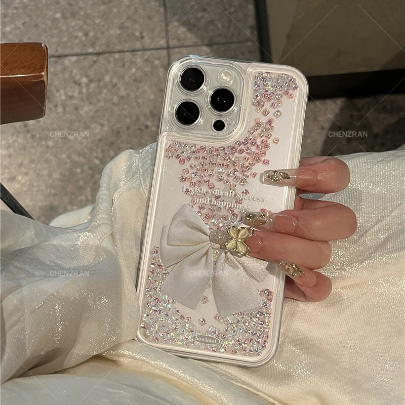 适用苹果16promax手机壳iPhone15甜美闪晶晶流沙亮片14plus蝴蝶结