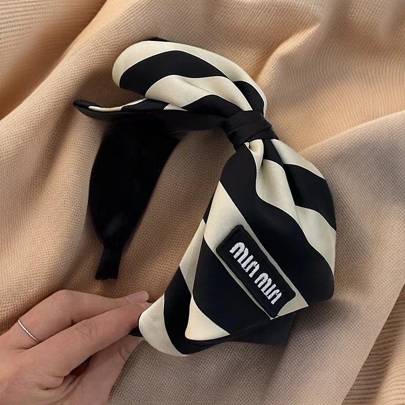 【洛琳饰品】发卡发箍女时尚条纹蝴蝶结逛街发捆头饰宽边压发头箍