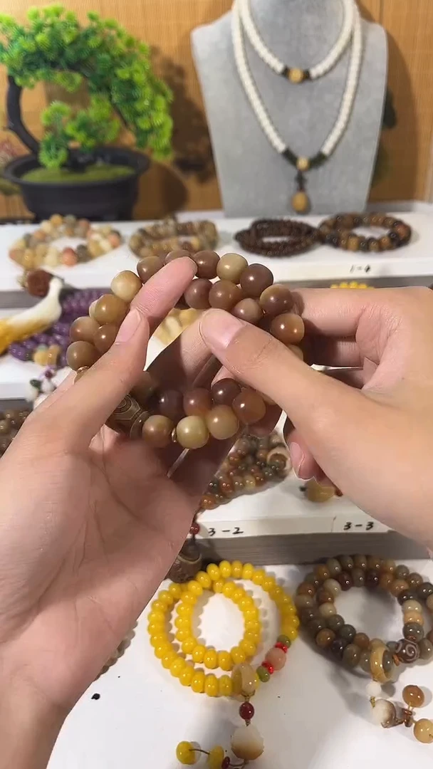 手串菩提根/象牙果卡11*12油王双圈