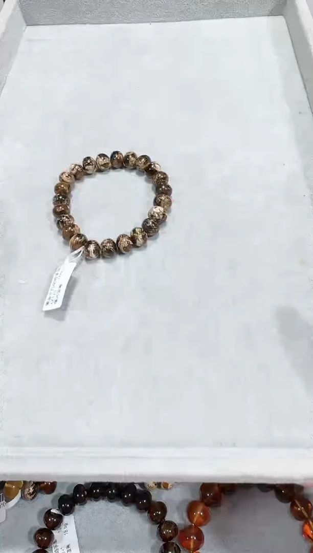 手链琥珀未镶嵌世****我抚顺琥珀    黑金干白花  10m
