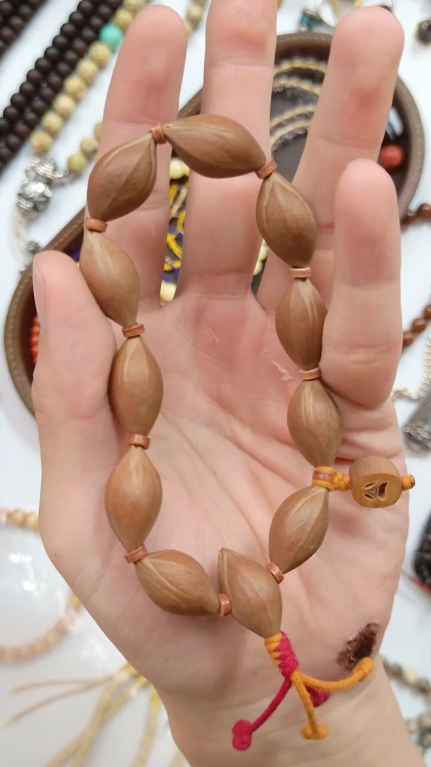 手串星月菩提油核三面佛12*23