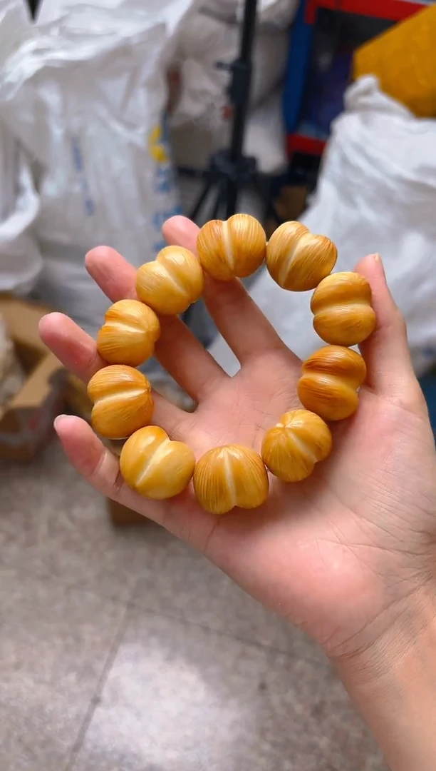 吊坠菩提根/象牙果黄色屁桃单圈手串