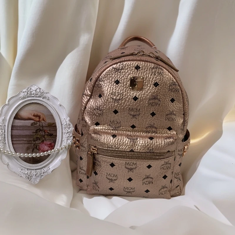 95新 MCM 26玫瑰金小号双肩包/EE12307722/7722