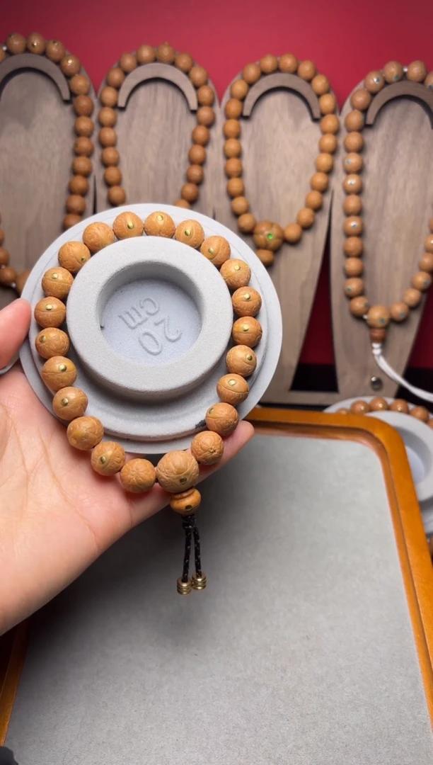 吊坠凤眼菩提李*烟12凤眼铜钉手串