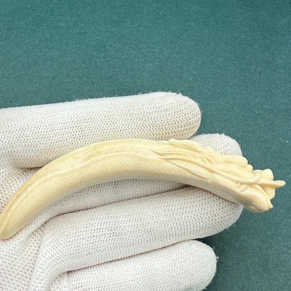 E7013天然猛犸牙龙头雕刻牙尖  假一赔四