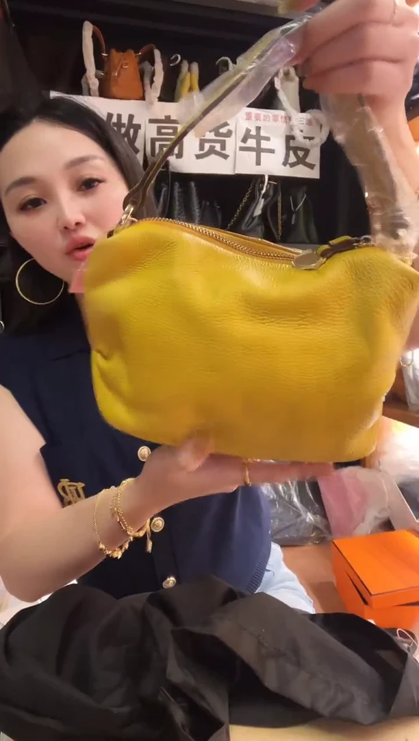 犏牛皮（革）珊瑚店清斜挎包真皮包时尚百搭包包