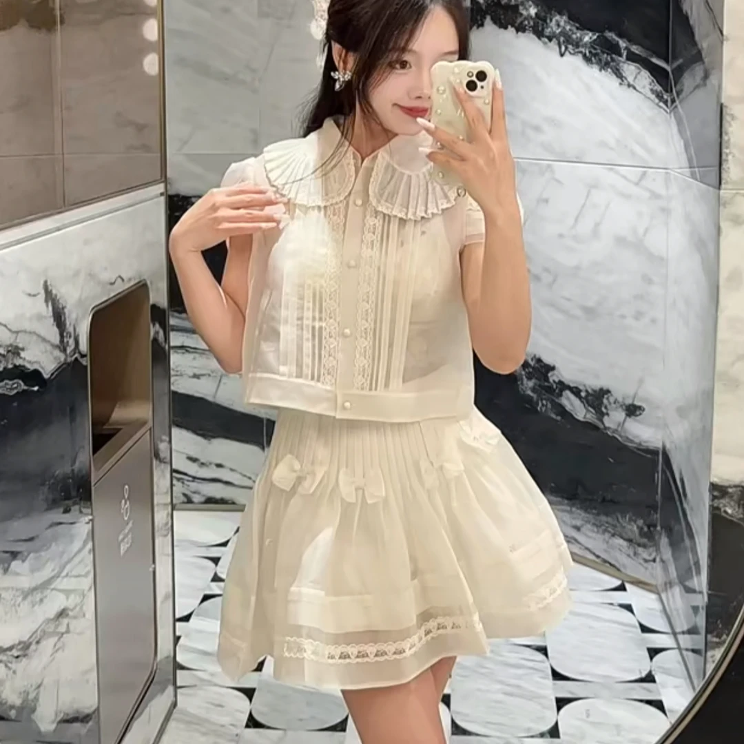 【DÉ MYSTÈRE】拉家2025秋季新款时尚气质百搭蝴蝶结半裙GZJ68203