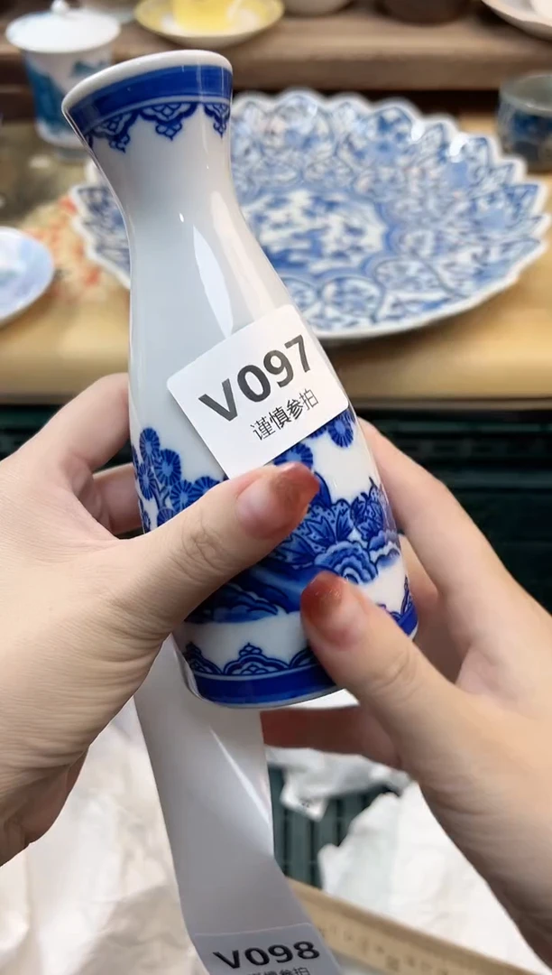 瓷片蒲***定  97