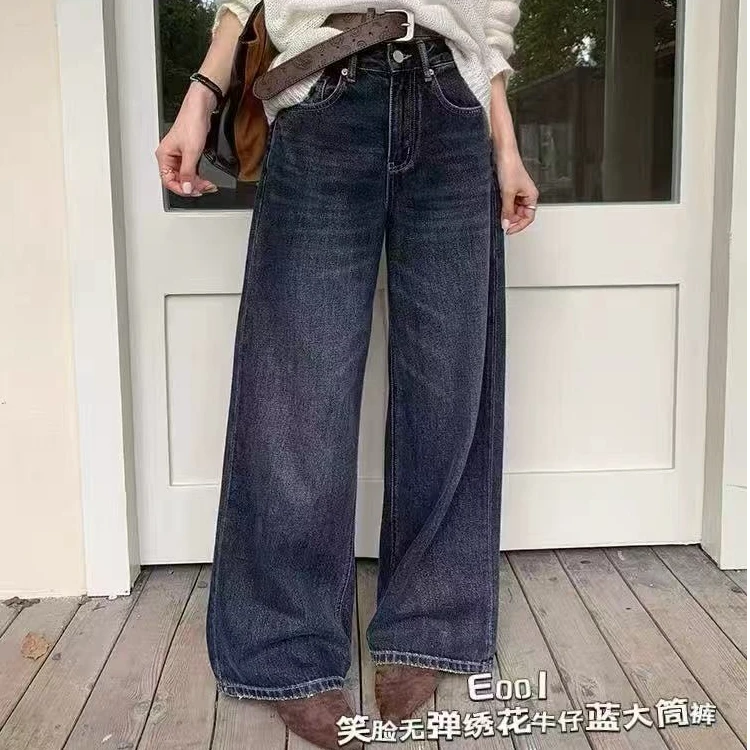 丹丹精选--001新款一粒扣拉链笑脸绣花磨破裤脚窄版牛仔裤