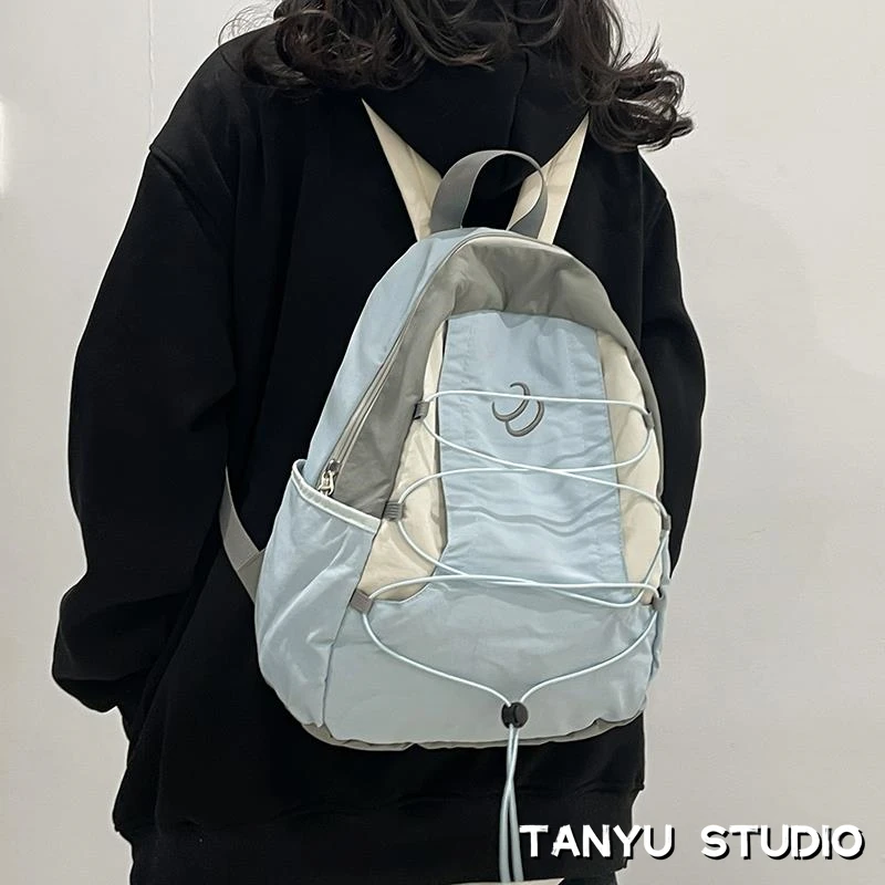 探屿书包女潮牌日系小众背包男款轻便运动户外旅行包大学生双肩包