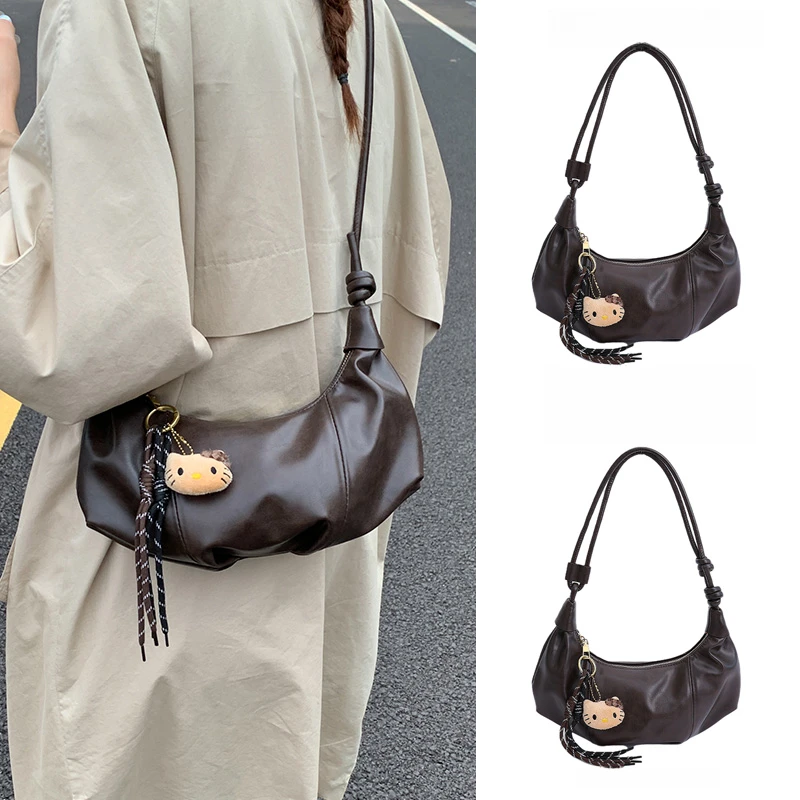 夏天大容量高级感通勤斜挎包包女2025新款流行复古咖色皮质饺子包