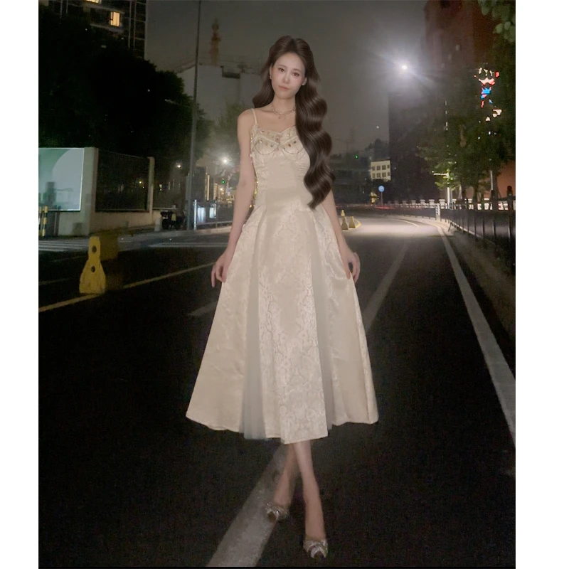 乔朵DUO【流光香槟】小众设计高级感吊带连衣裙收腰显瘦长款2025女